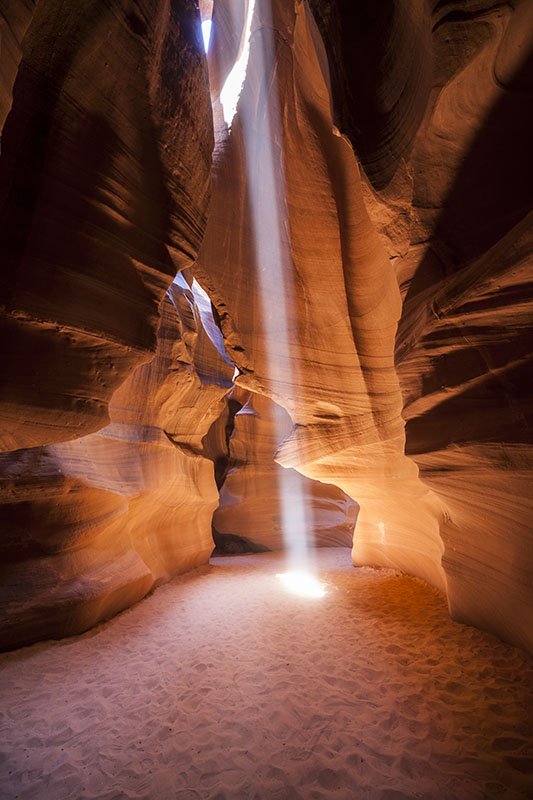 A shaft of light falling into Upper Antelope Canyon