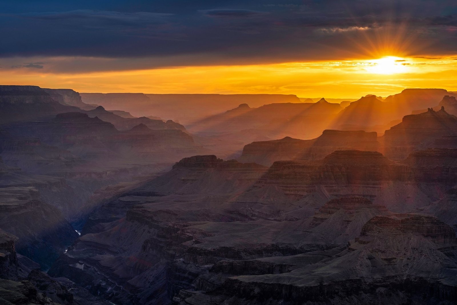 Sunrise light breaking over the Grand Canyon