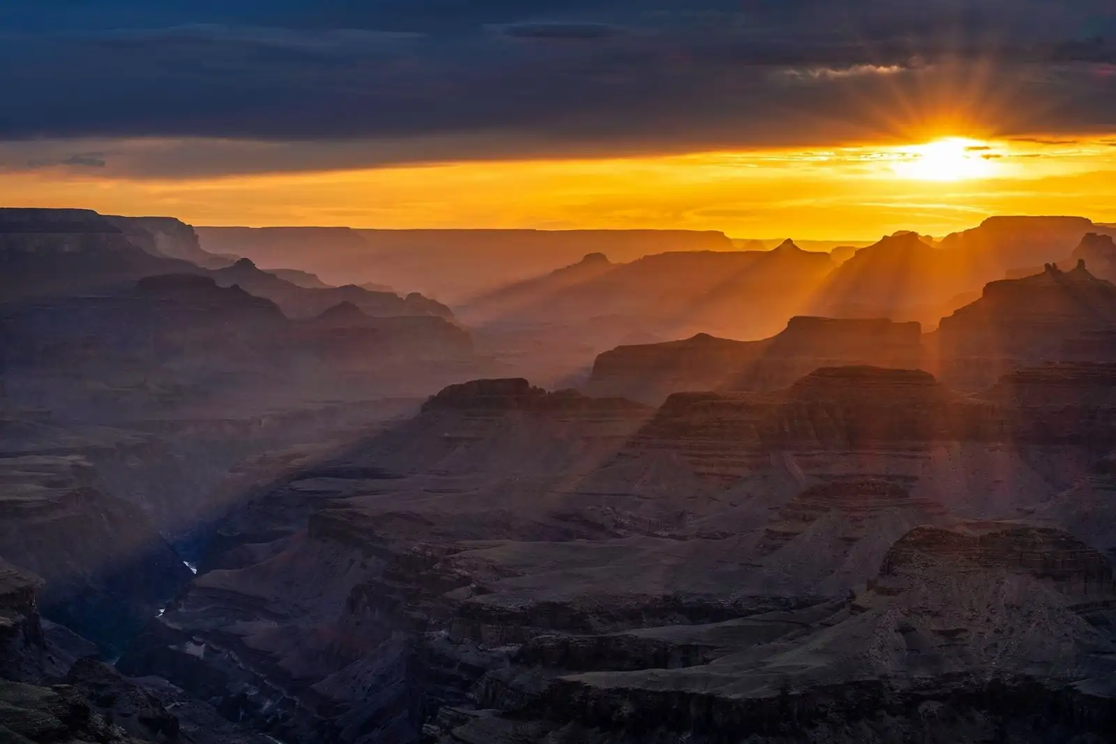 Sunrise light breaking over the Grand Canyon