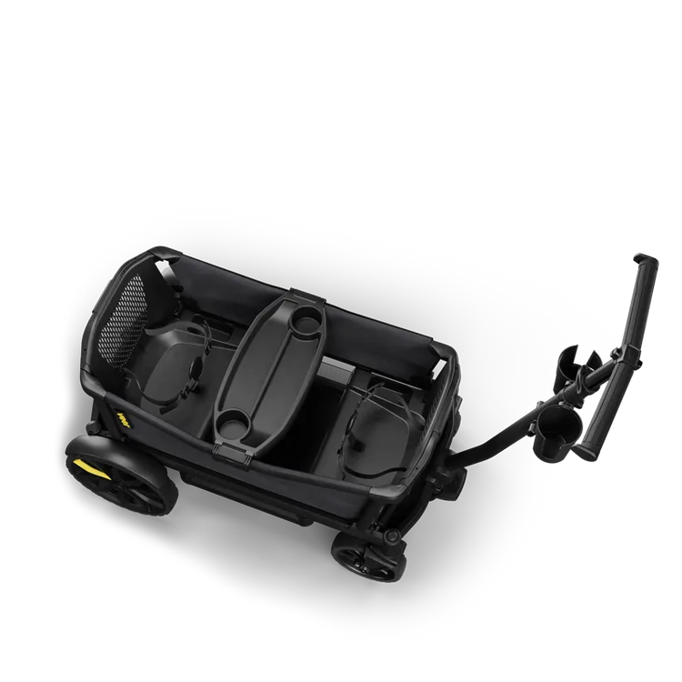 The Veer Cruiser from above on a clean studio background, showing the two seats with harnesses and the snack tray between them. Product photo from Veer.